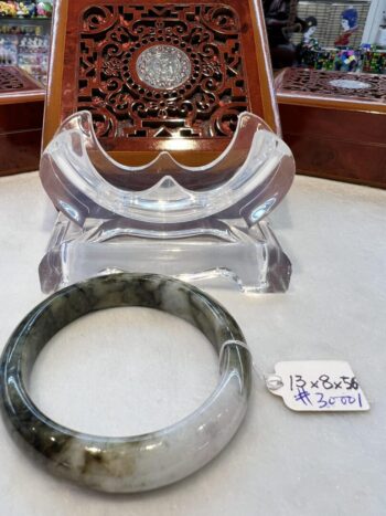 A couple of bracelets are on display in a store