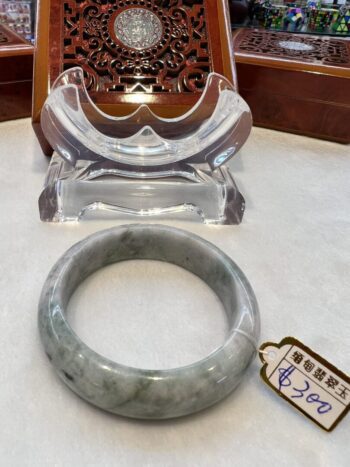 A close up of an old bangle on a table