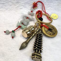 A key chain with various charms and beads.