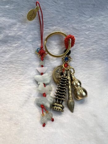 A key chain with some charms hanging from it