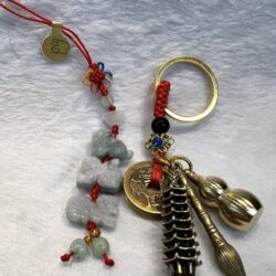 A key chain with some charms and beads