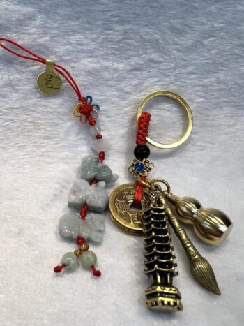 A key chain with some charms and beads