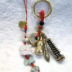 A key chain with various charms and beads.