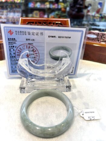 A plastic bracelet sitting on top of a table.