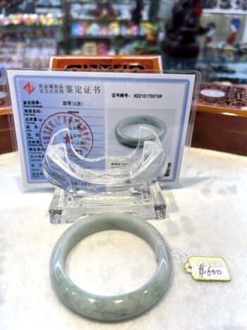 A plastic bangle sitting on top of a table.