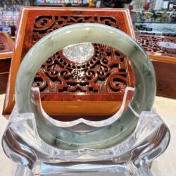 A close up of a glass ring on display