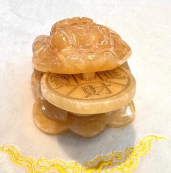 A stack of three cookies sitting on top of each other.