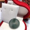 A close up of a glass bowl on top of a chair