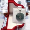 A necklace in its box on display.