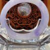 A close up of the inside of an asian style table.