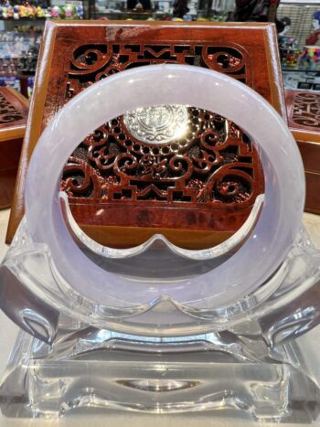 A close up of an object with a wooden background