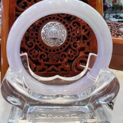 A white circular glass object sitting on top of a table.