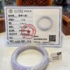 A white ring sitting on top of a table.