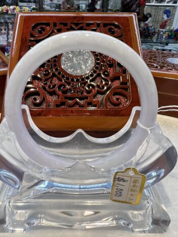 A clear plastic object sitting on top of a table.