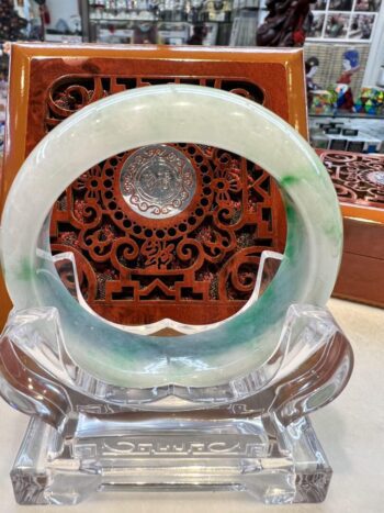 A close up of an asian bangle on display