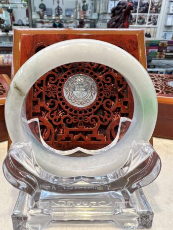 A white and red plate sitting on top of a table.