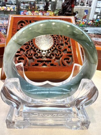 A close up of an asian style table with a glass bowl