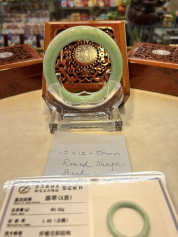 A green glass plate sitting on top of a table.