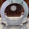 A close up of the bottom of a glass sculpture