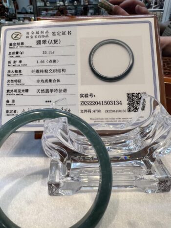 A glass ring sitting on top of a table.