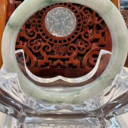 A close up of the inside of an asian style clock.