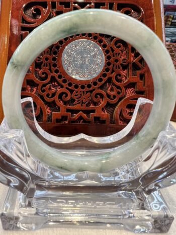 A close up of the inside of an asian style clock.