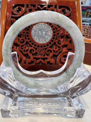 A large circular glass plate with a decorative design.