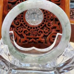 A close up of the inside of an asian style clock.