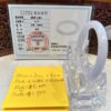A yellow note and some clear plastic rings