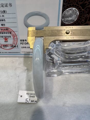 A metal ruler and some plastic parts