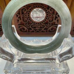 Deep green jade circle with gloss