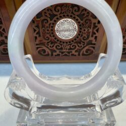 Pale lavender jade bangle on clear base