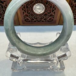 Circular jade bangle with pale hues