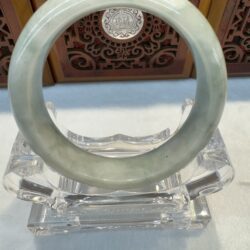 Circular light green jade bracelet front