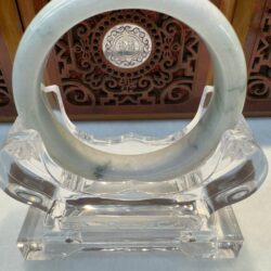 Milky jade bangle with faint green veins