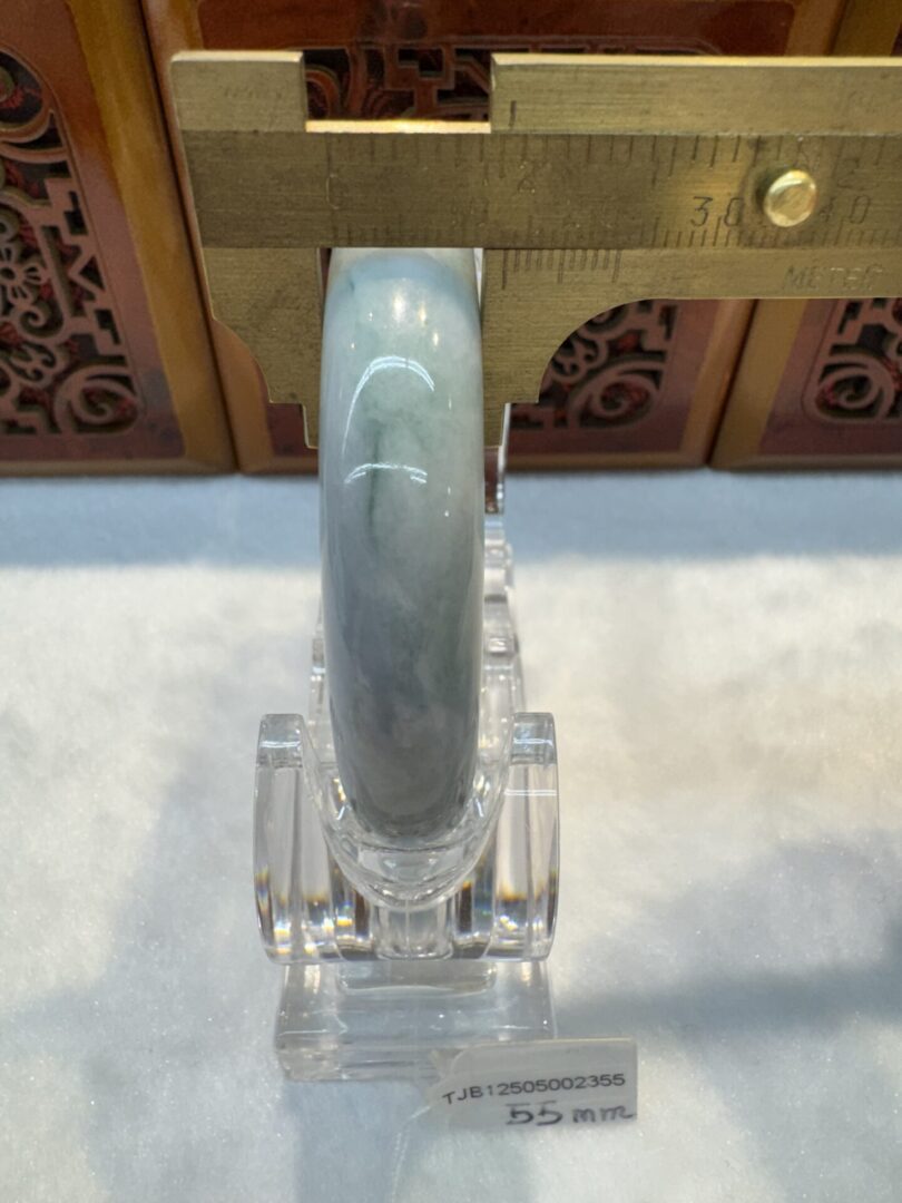 Pale green jade bangle, 55 mm