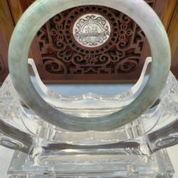 Greenish jade circle centered on crystal base