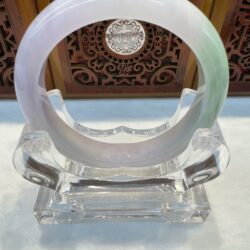 Lavender and green jade bangle on acrylic stand