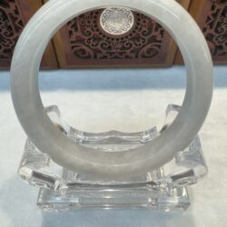 Close-up of circular jade bangle