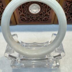 Round white jade bangle front view display