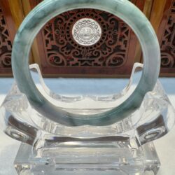 Translucent green jade bangle centered