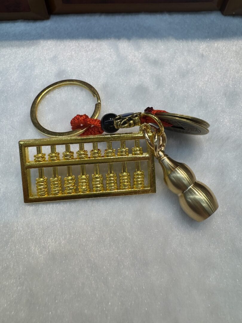 Keychain with copper coin and abacus - Image 2